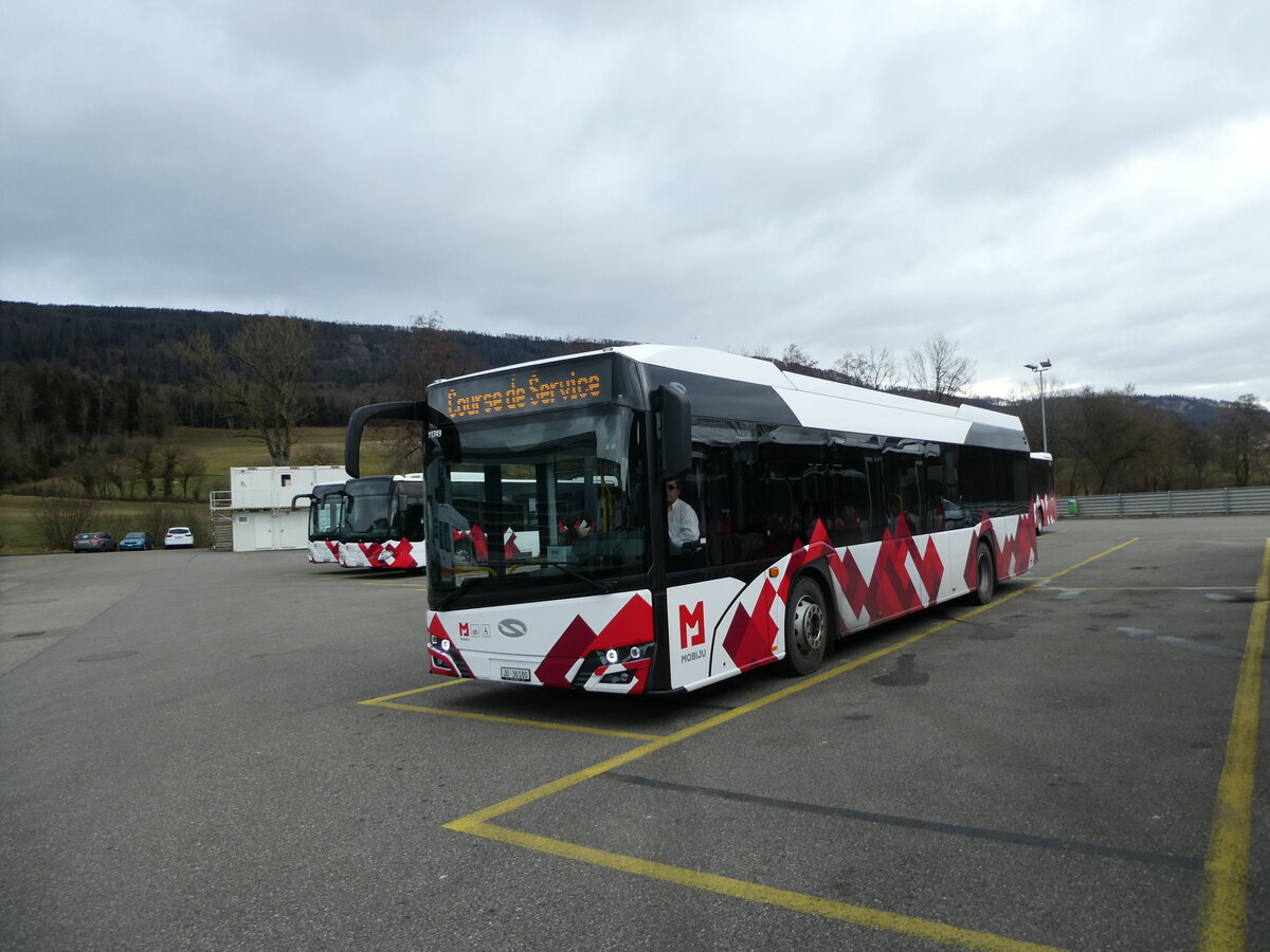 (232'654) - CarPostal Ouest - JU 36'180 - Solaris am 6. Februar 2022 in Develier, Parkplatz