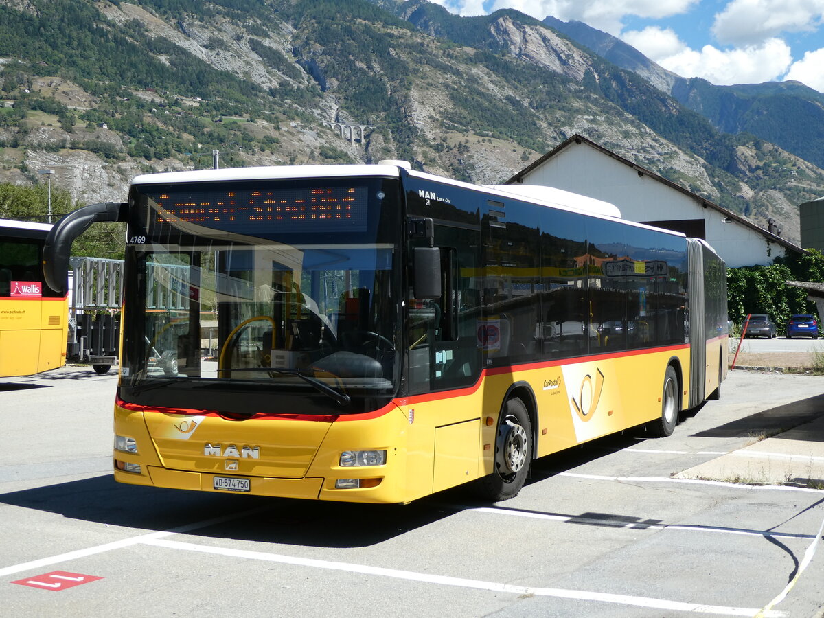 (239'402) - SEFA, Aubonne - VD 574'750 - MAN (ex CarPostal Ouest; ex Buchard, Leytron; ex Buchard, Leytron Nr. 161) am 21. August 2022 beim Bahnhof Gampel-Steg