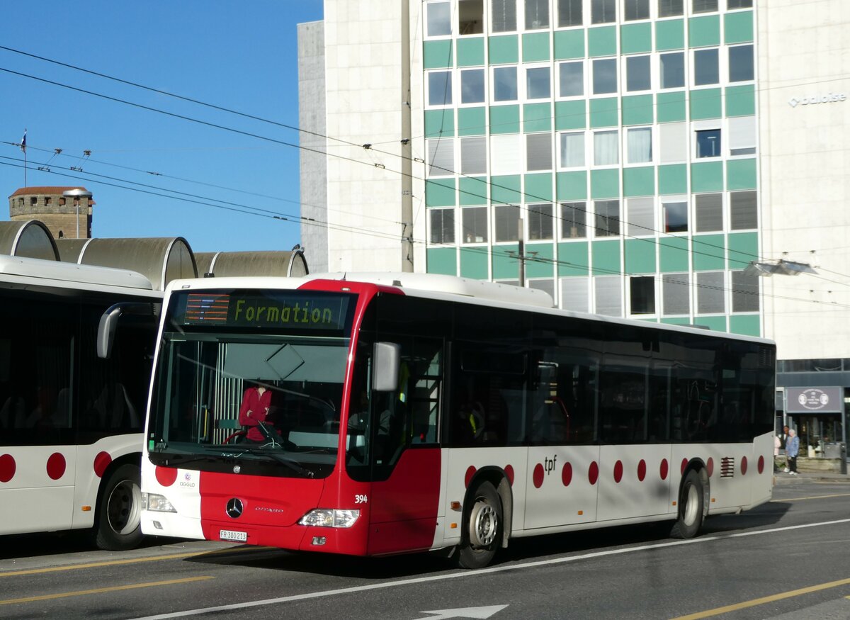 (242'386) - TPF Fribourg - Nr. 394/FR 300'213 - Mercedes (ex Nr. 802) am 10. November 2022 beim Bahnhof Fribourg