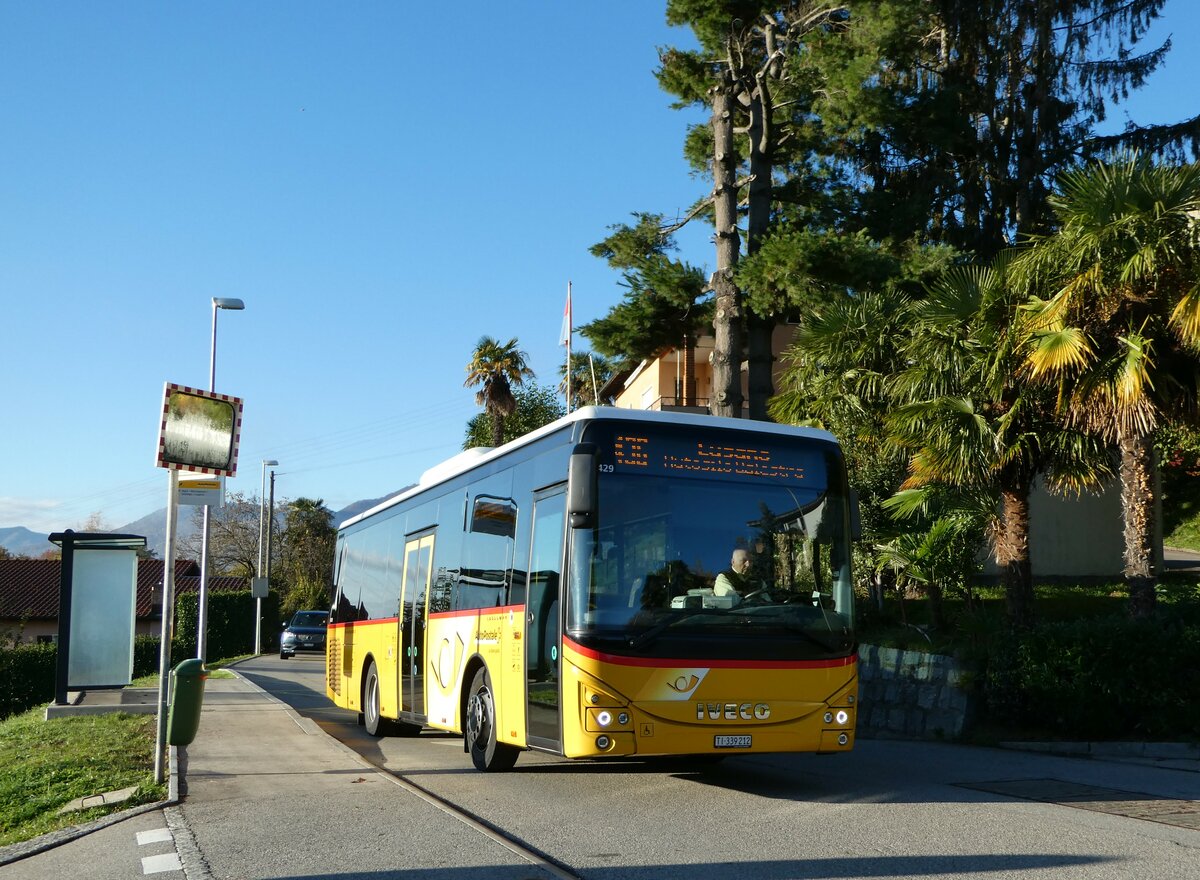 (242'851) - AutoPostale Ticino - TI 339'212 - Iveco am 17. November 2022 in Agra, Rondelli