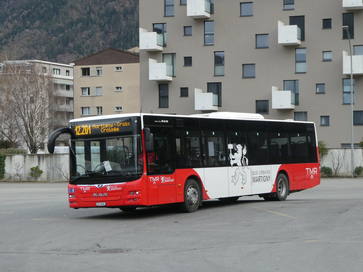 (245'061) - TMR Martigny - Nr. 154/VS 1454 - MAN am 14. Januar 2023 beim Bahnhof Martigny