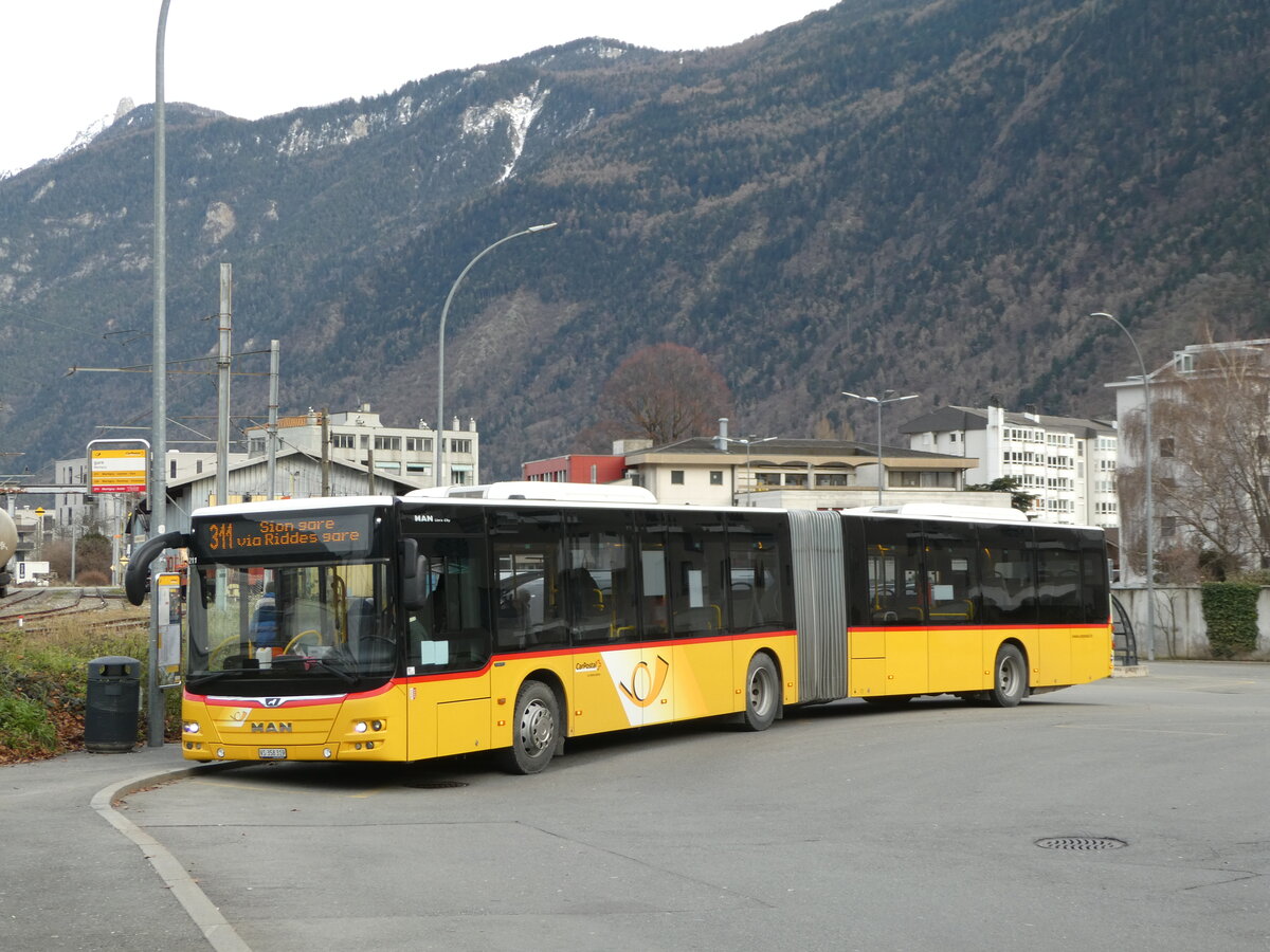 (245'062) - PostAuto Wallis - Nr. 52/VS 358'319/PID 11'211 - MAN (ex TMR Martigny Nr. 142) am 14. Januar 2023 beim Bahnhof Martigny