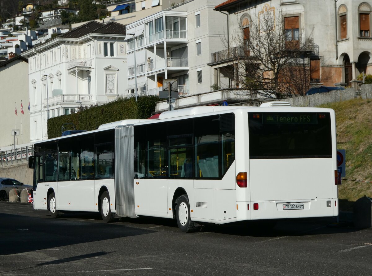 (245'895) - Intertours, Domdidier - Nr. 659/FR 300'659 - Mercedes (ex Nr. 205; ex VZO Grningen Nr. 29) am 7. Februar 2023 beim Bahnhof Locarno