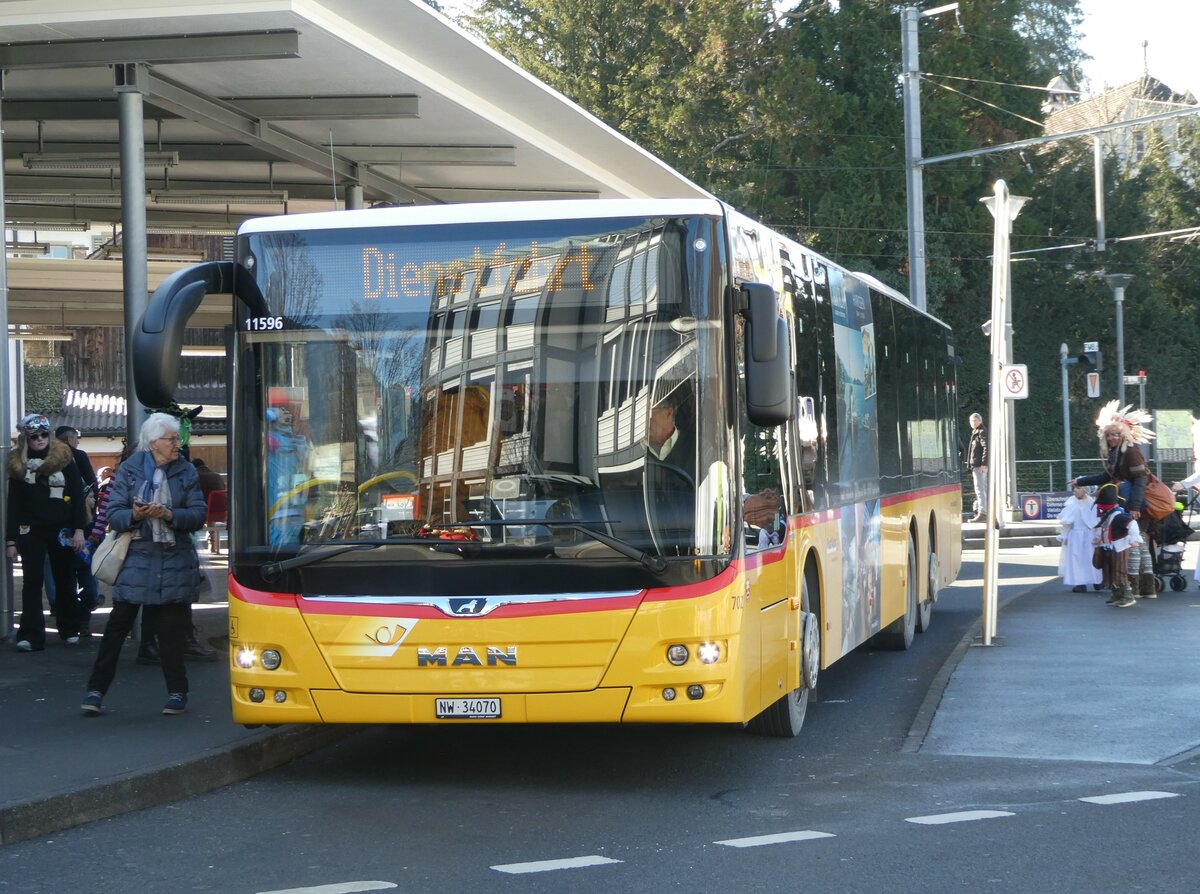 (246'172) - PostAuto Zentralschweiz - Nr. 702/NW 34'070/PID 11'596 - MAN (ex Nr. 72) am 16. Februar 2023 beim Bahnhof Stans