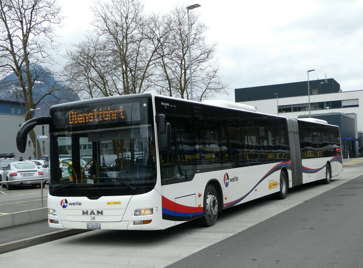 (246'746) - PostAuto Nordschweiz - AG 140'683/PID 5007 - MAN (ex Steffen, Remetschwil Nr. 58) am 27. Februar 2023 beim Bahnhof Interlaken Ost