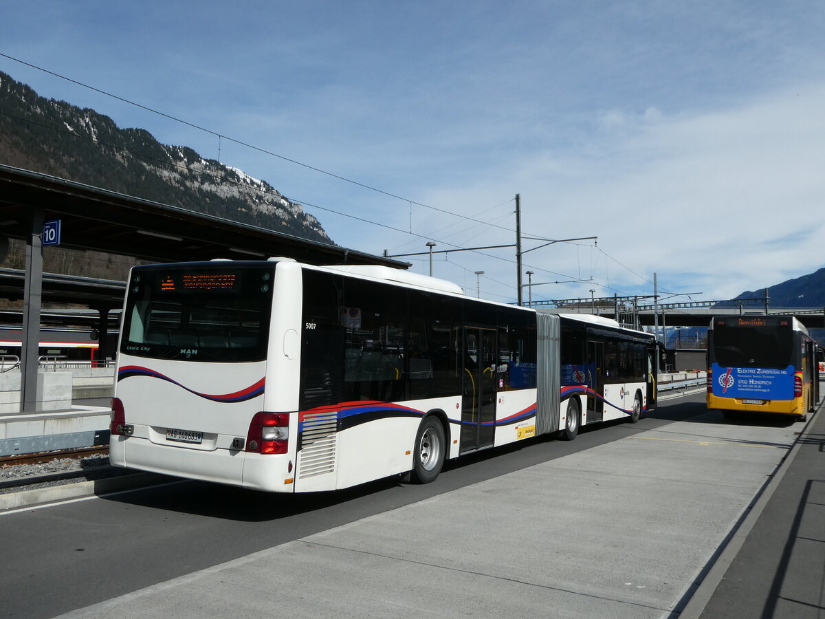 (247'198) - PostAuto Nordschweiz - AG 140'683/PID 5007 - MAN (ex Steffen, Remetschwil Nr. 58) am 13. Mrz 2023 beim Bahnhof Interlaken Ost