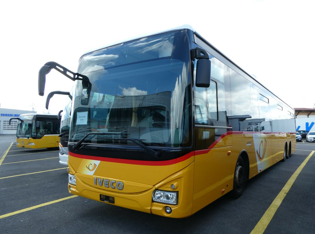 (248'205) - CarPostal Ouest - Iveco (ex Ballestraz, Grne; ex Vorfhrfahrzeug Iveco France) am 8. April 2023 in Kerzers, Interbus