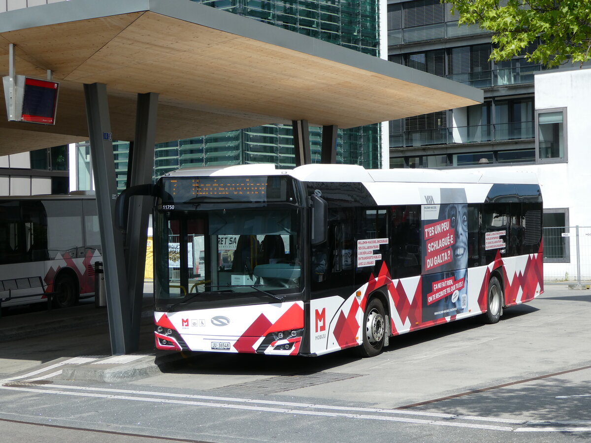 (250'163) - CarPostal Ouest - JU 36'548/PID 11'750 - Solaris am 18. Mai 2023 beim Bahnhof Delmont