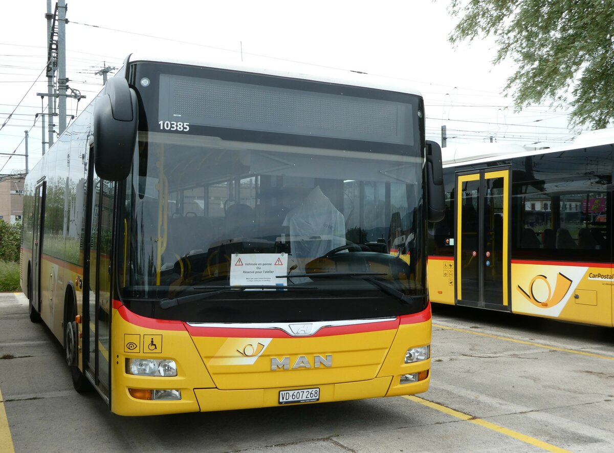 (250'179) - CarPostal Ouest - VD 607'268/PID 10'385 - MAN (ex JU 52'241; ex Nr. 60) am 18. Mai 2023 in Yverdon, Garage