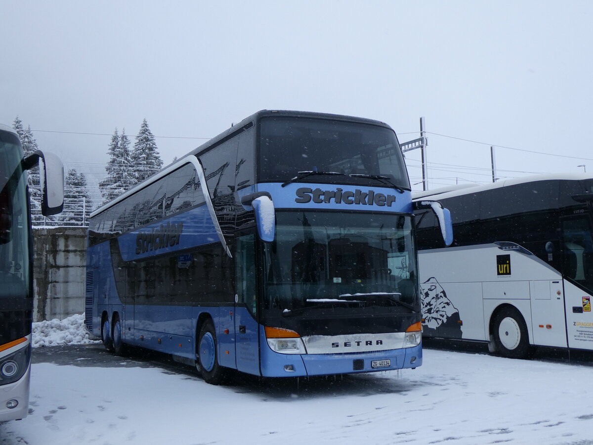 (259'529) - Strickler, Neuheim - Nr. 2/ZG 40'134 - Setra am 23. Februar 2024 in Andermatt, Bahnhofplatz