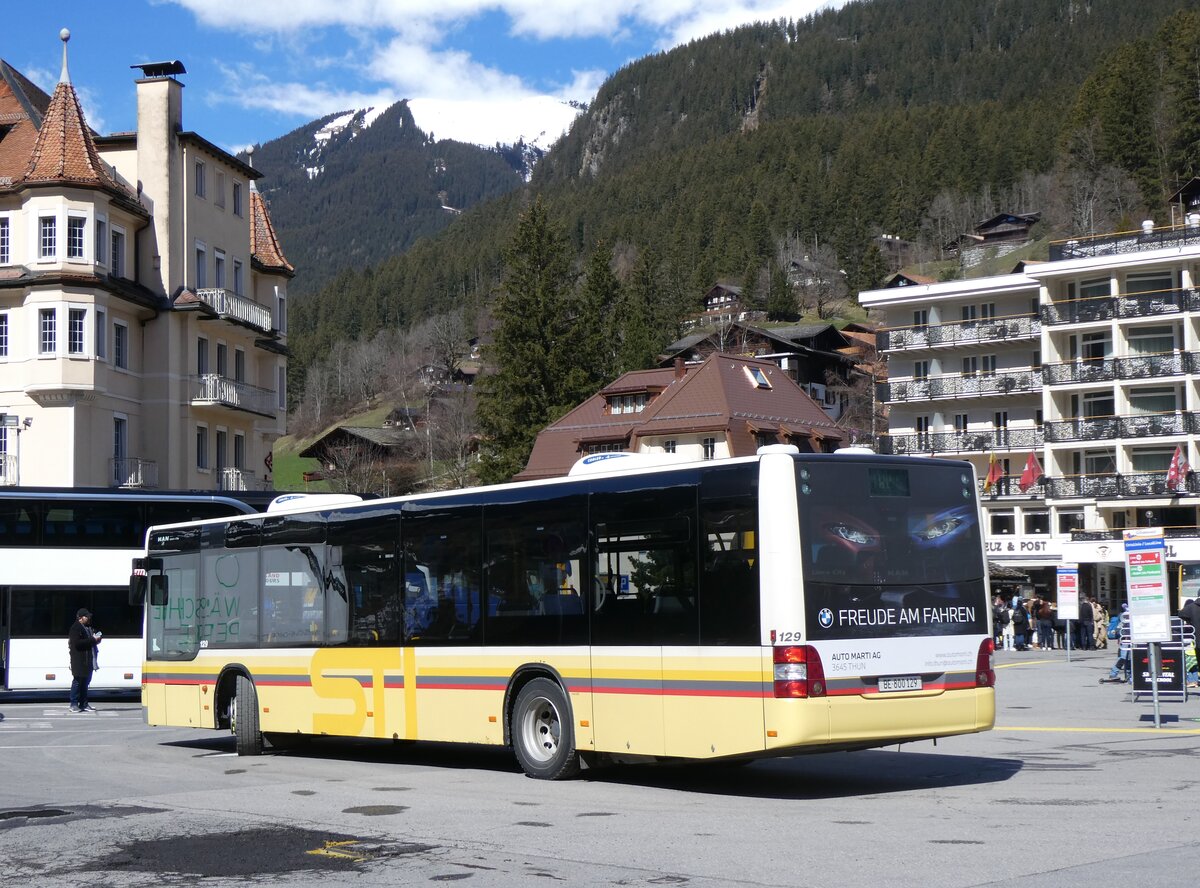 (260'536) - STI Thun - Nr. 129/BE 800'129 - MAN am 19. Mrz 2024 beim Bahnhof Grindelwald