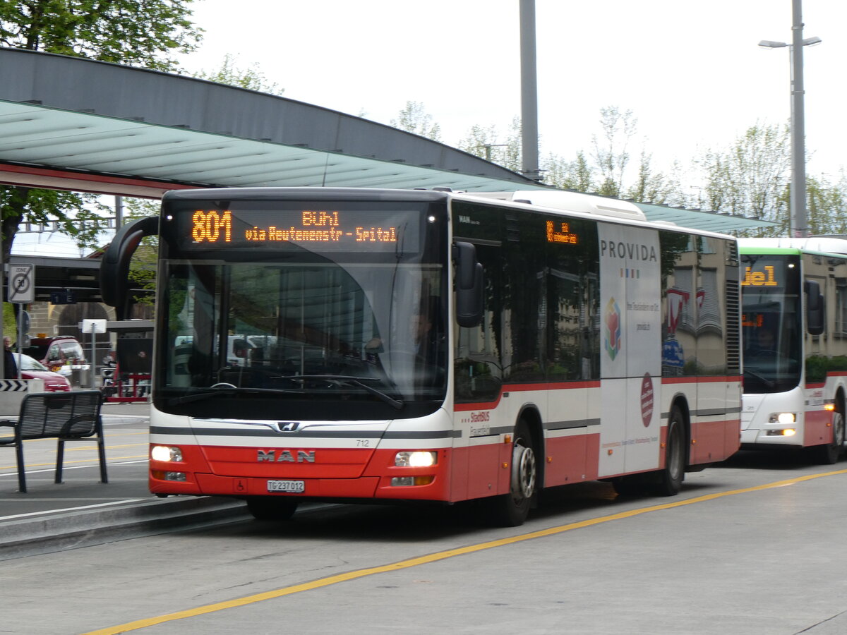 (261'105) - StadtBUS, Frauenfeld - Nr. 712/TG 237'012 - MAN (ex PostAuto Ostschweiz PID 10'104) am 9. April 2024 beim Bahnhof Frauenfeld