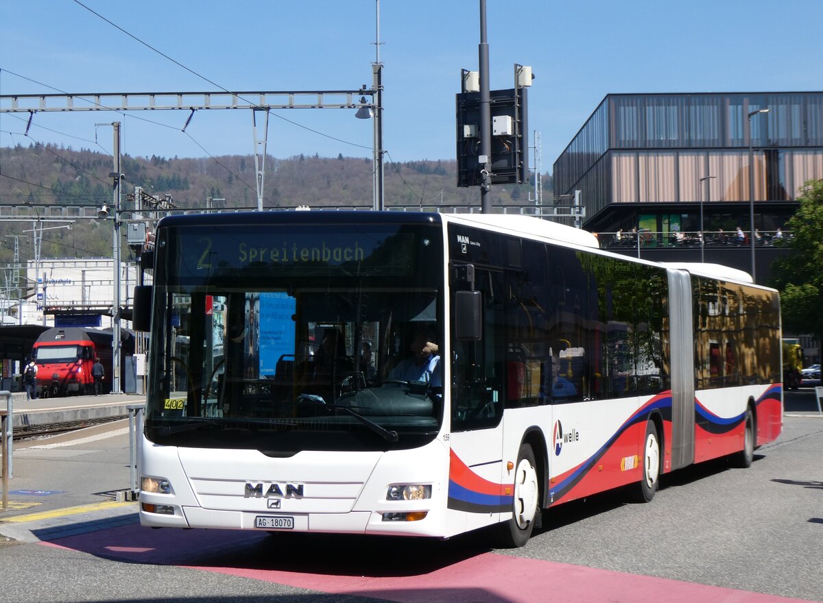 (261'143) - RVBW Wettingen - Nr. 159/AG 18'070 - MAN am 12. April 2024 beim Bahnhof Baden