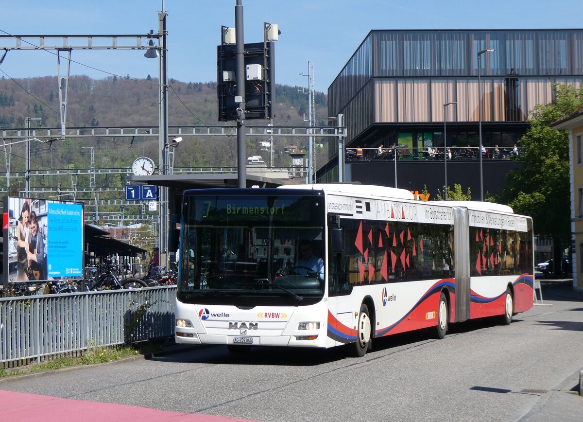 (261'145) - Twerenbold, Baden - Nr. 305/AG 459'045 - MAN am 12. April 2024 beim Bahnhof Baden