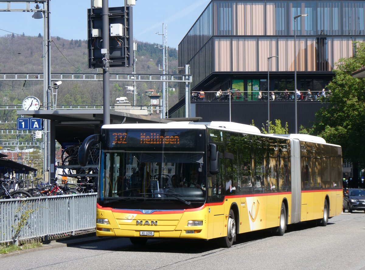 (261'157) - Twerenbold, Baden - Nr. 15/AG 6298/PID 10'351 - MAN am 12. April 2024 beim Bahnhof Baden