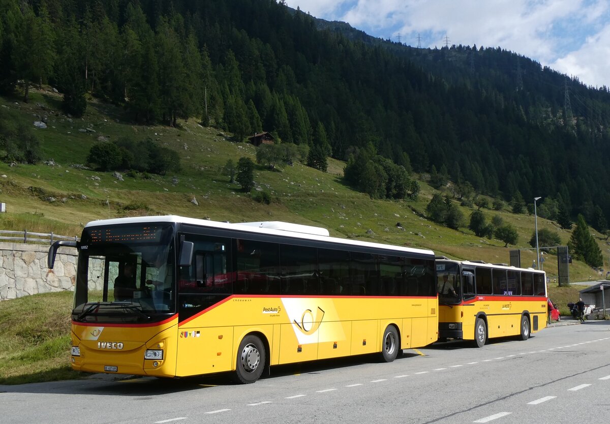 (265'130) - PostAuto Bern - BE 487'695/PID 10'952 - Iveco am 28. Juli 2024 beim Bahnhof Oberwald