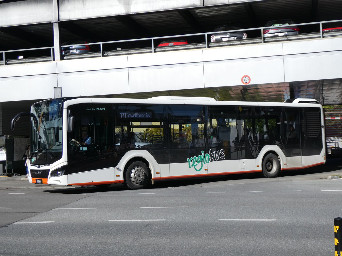 (268'213) - Regiobus, Gossau - Nr. 14/SG 360'775 - MAN am 17. Oktober 2024 beim Bahnhof Herisau 