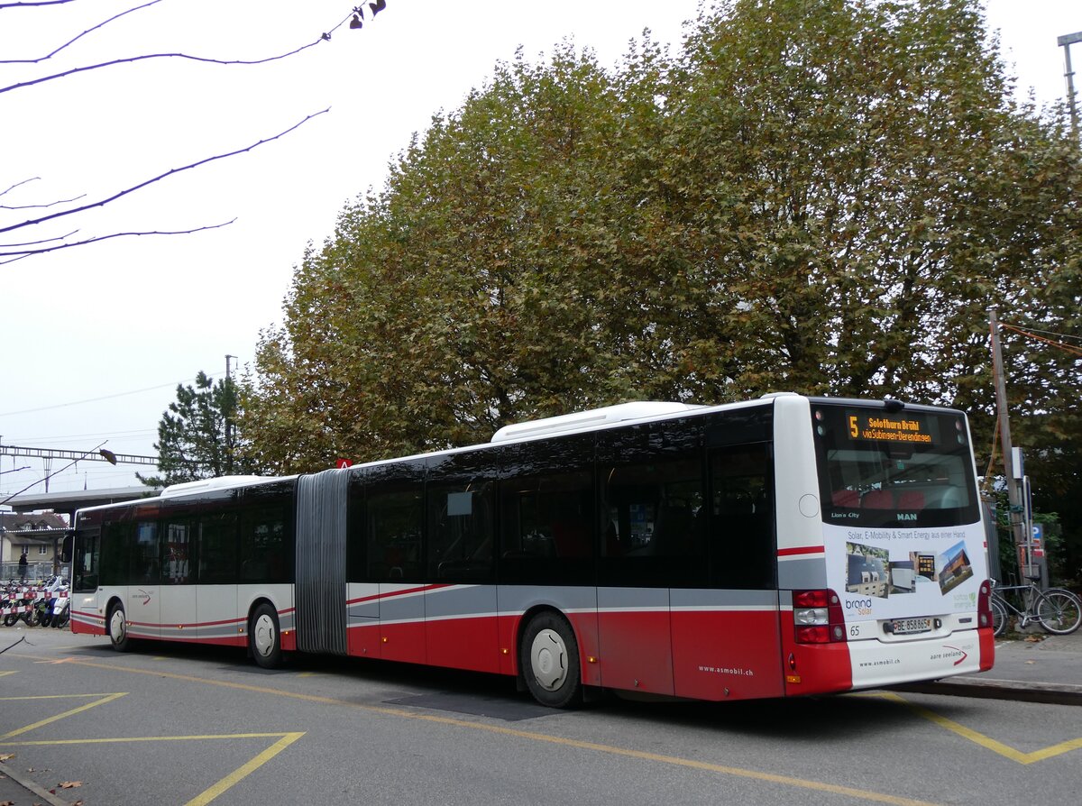 (268'848) - ASm Langenthal - Nr. 65/BE 858'865 - MAN am 31. Oktober 2024 beim Bahnhof Herzogenbuchsee