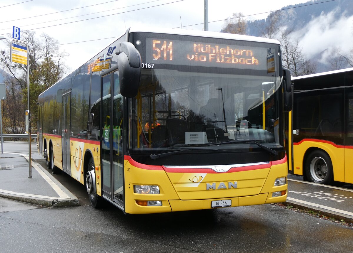 (269'253) - Niederer, Filzbach - Nr. 31/GL 44/PID 10'167 - MAN (ex Schwizer, Goldach; ex Casutt, Gossau) am 19. November 2024 beim Bahnhof Ziegelbrcke