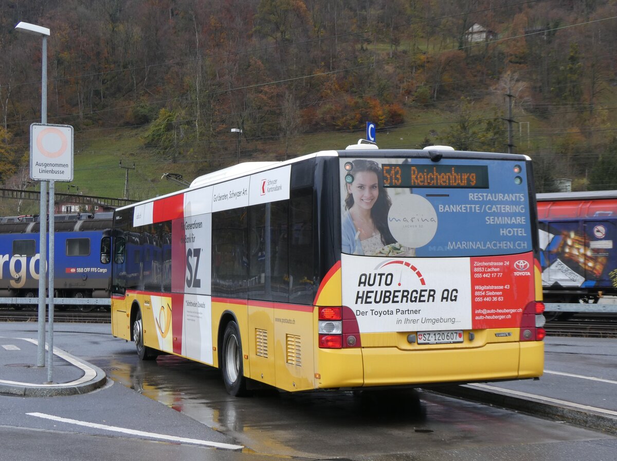 (269'263) - PostAuto Ostschweiz - SZ 120'607/PID 10'490 - MAN (ex Kistler, Reichenburg) am 19. November 2024 beim Bahnhof Ziegelbrcke