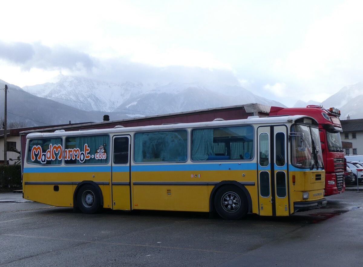 (270'025) - MadMarmot, Nyon - Saurer/Tscher (ex Auto-Transports, La Cte-aux-Fes; ex P 24'238) am 20. Dezember 2024 in Fully, Stade de Charnot