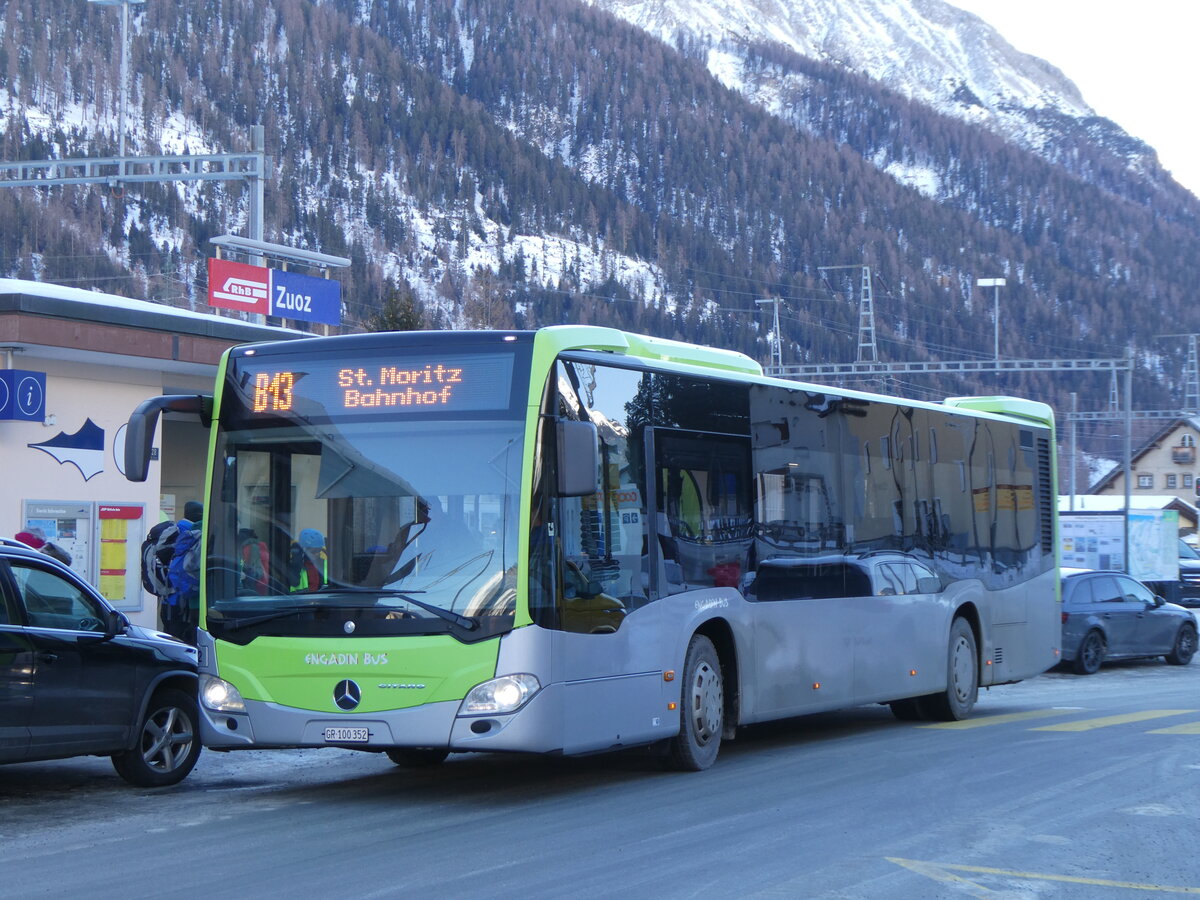 (270'256) - Engadin Bus, St. Moritz - GR 100'352 - Mercedes (ex Busland, Burgdorf Nr. 112) am 27. Dezember 2024 beim Bahnhof Zuoz