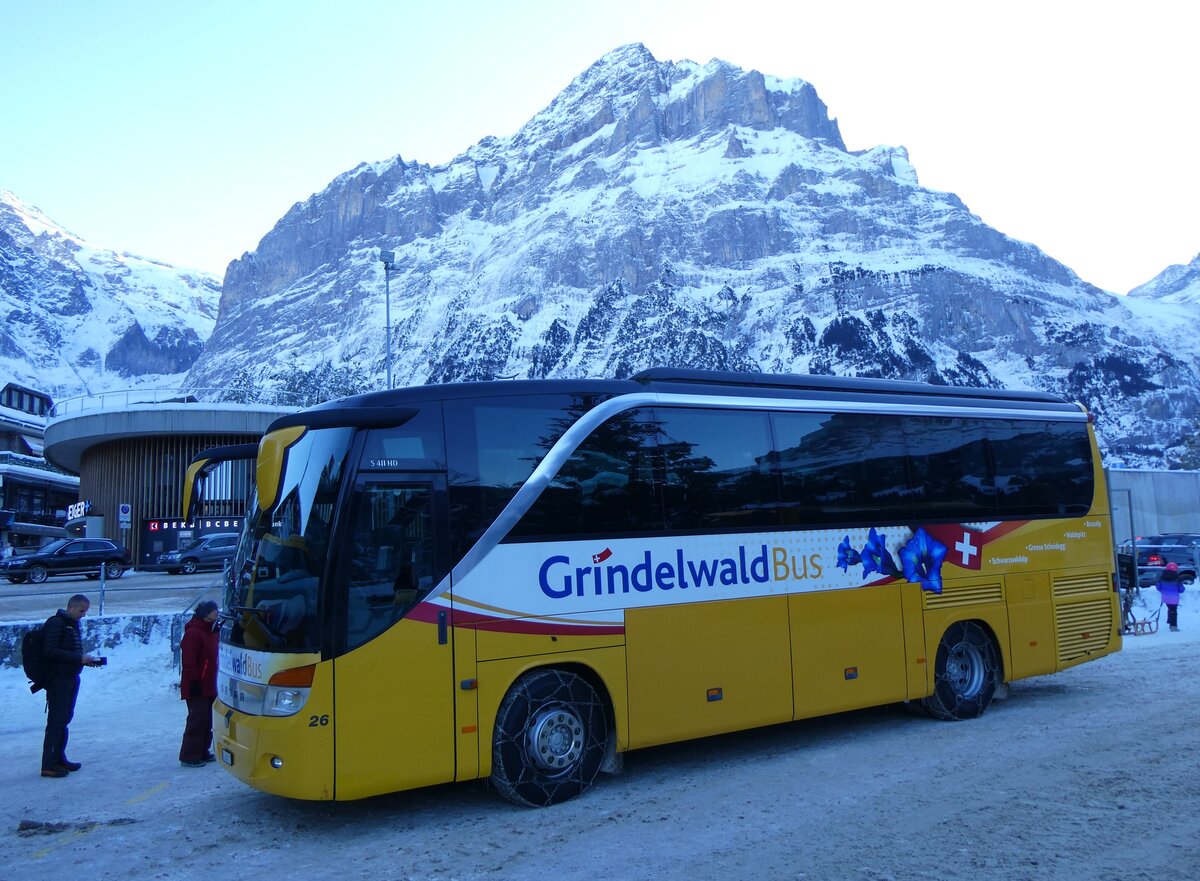 (270'340) - GrindelwaldBus, Grindelwald - Nr. 26/BE 268'737 - Setra am 29. Dezember 2024 beim Bahnhof Grindelwald