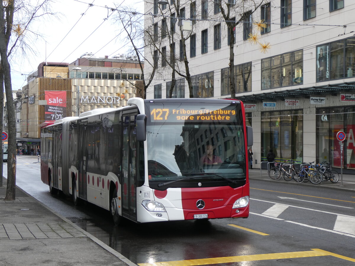 (270'785) - TPF Fribourg - Nr. 116/FR 300'376 - Mercedes am 9. Januar 2025 beim Bahnhof Fribourg