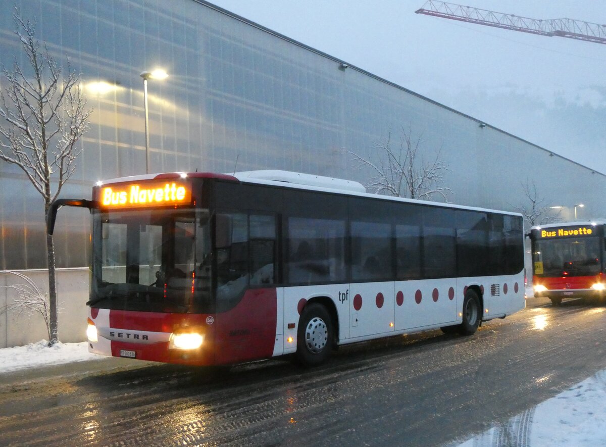 (270'826) - Wieland, Murten - Nr. 58/FR 300'636 - Setra am 11. Januar 2025 beim Bahnhof Frutigen