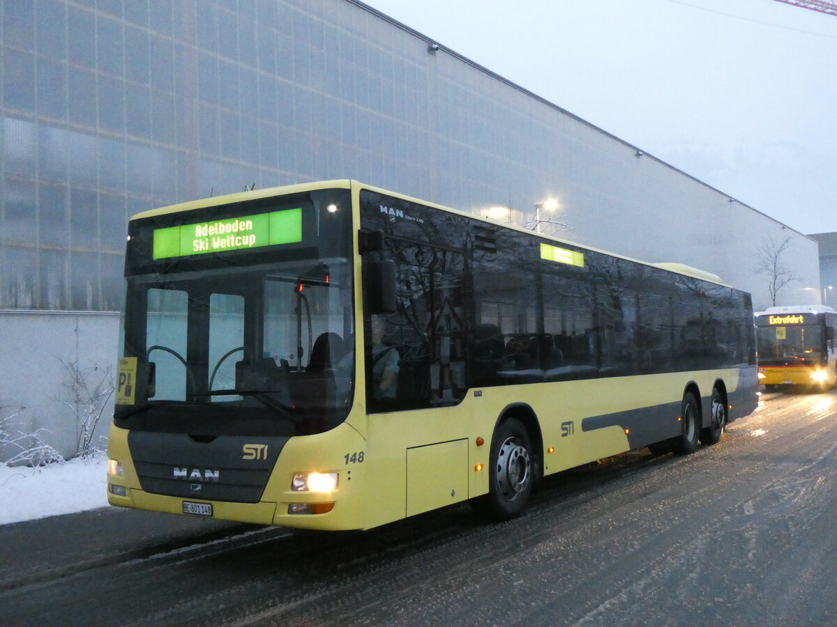 (270'829) - STI Thun - Nr. 148/BE 801'148 - MAN am 11. Januar 2025 beim Bahnhof Frutigen