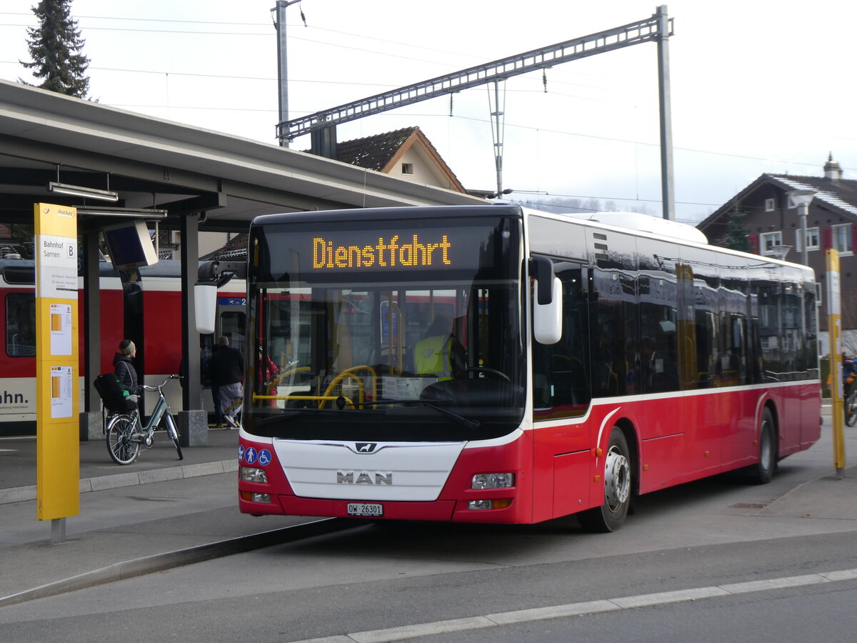 (271'203) - PostAuto Zentralschweiz - Nr. 530/OW 26'301/PID 12'338 - MAN (ex Dr. Richard, A-Wien Nr. 1418) am 14. Januar 2025 beim Bahnhof Sarnen