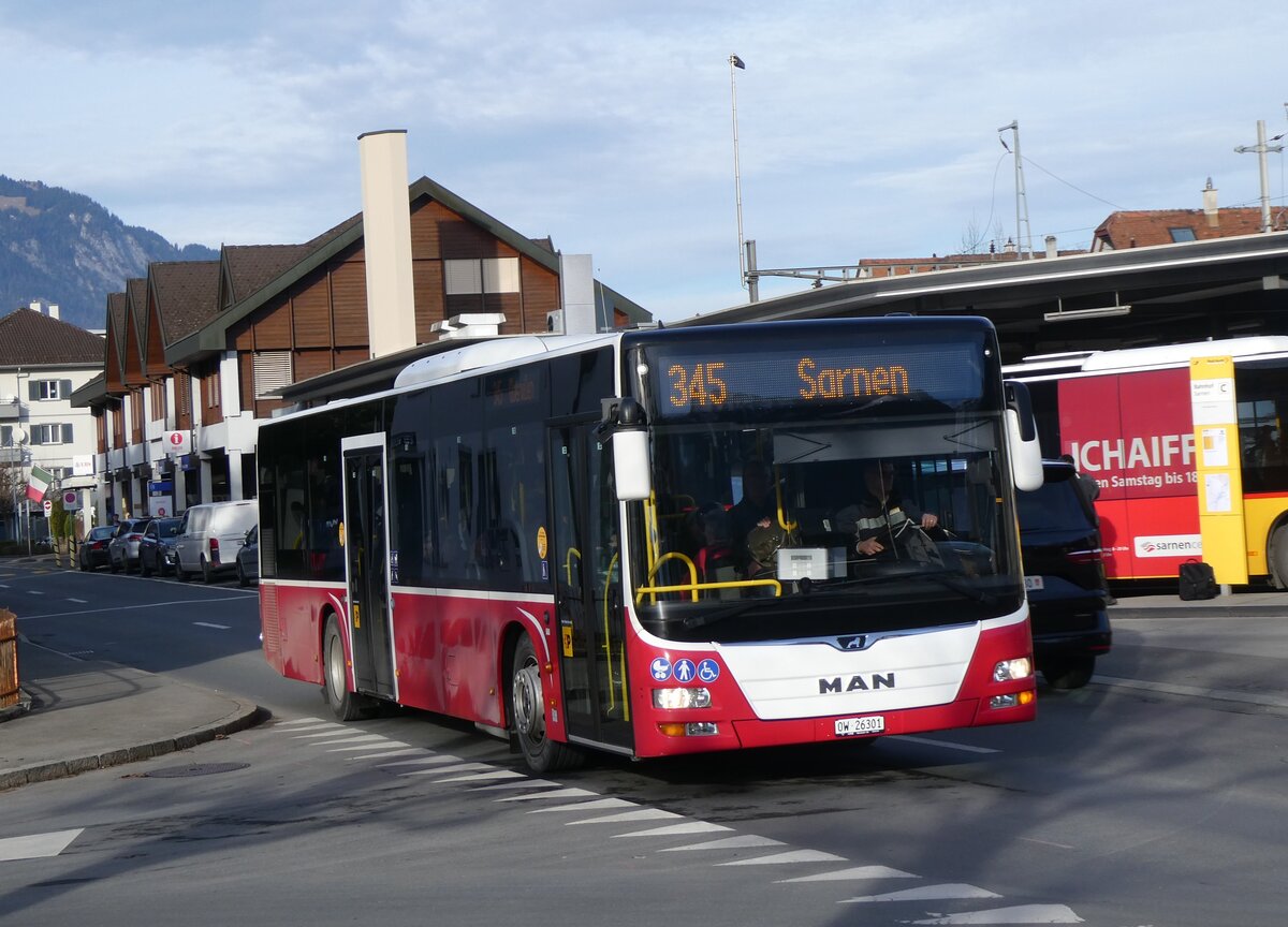 (271'452) - PostAuto Zentralschweiz - Nr. 530/OW 16'301/PID 12'338 - MAN (ex Dr. Richard, A-Wien Nr. 1418) am 24. Januar 2025 beim Bahnhof Sarnen