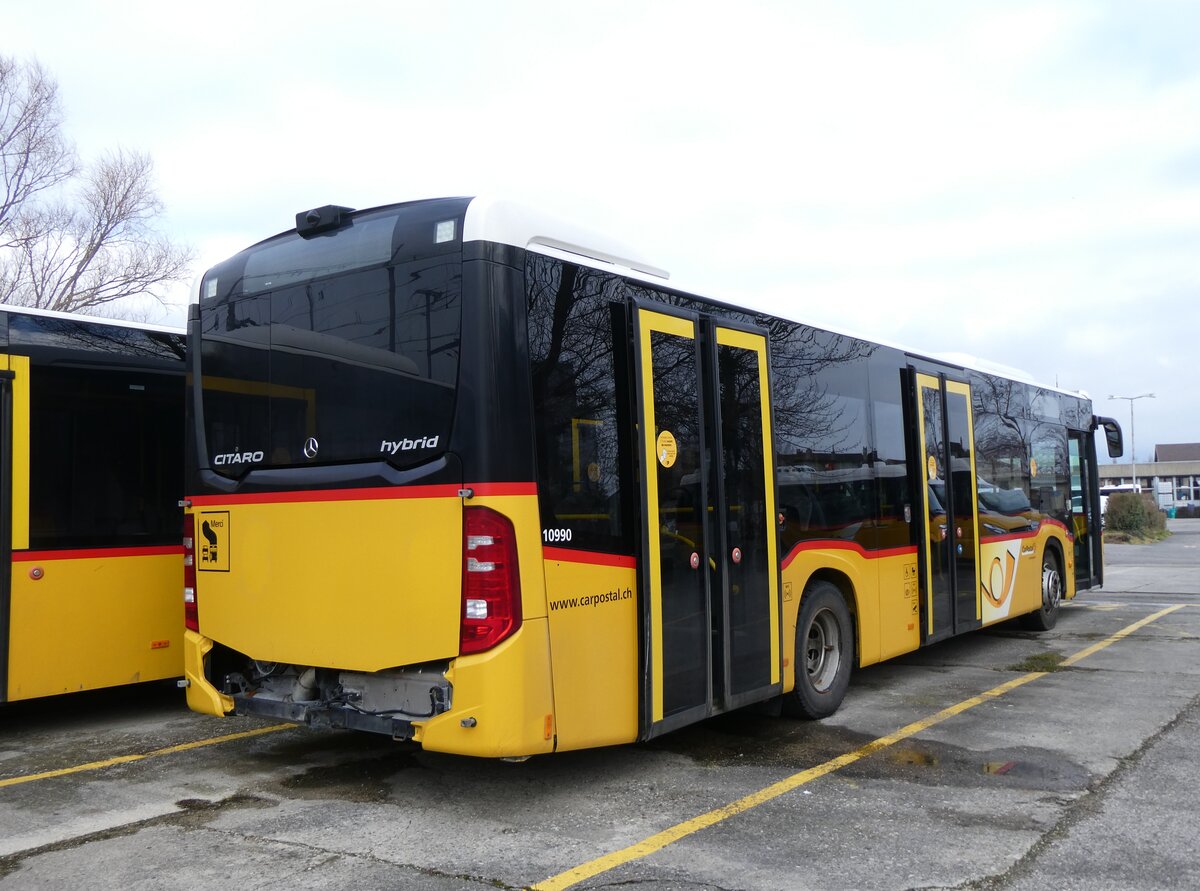 (271'566) - CarPostal Ouest - PID 10'990 - Mercedes (ex JU 43'870) am 1. Februar 2025 in Yverdon, Garage