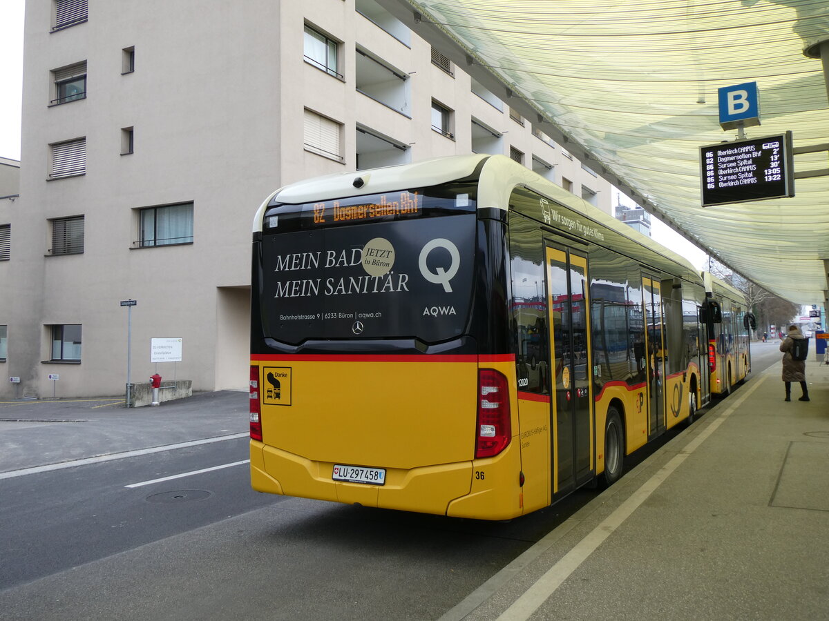 (271'693) - Hfliger, Sursee - Nr. 36/LU 297'458/PID 12'020 - eMercedes (ex vermietet an PostAuto Zentralschweiz Nr. 568) am 7. Februar 2025 beim Bahnhof Sursee