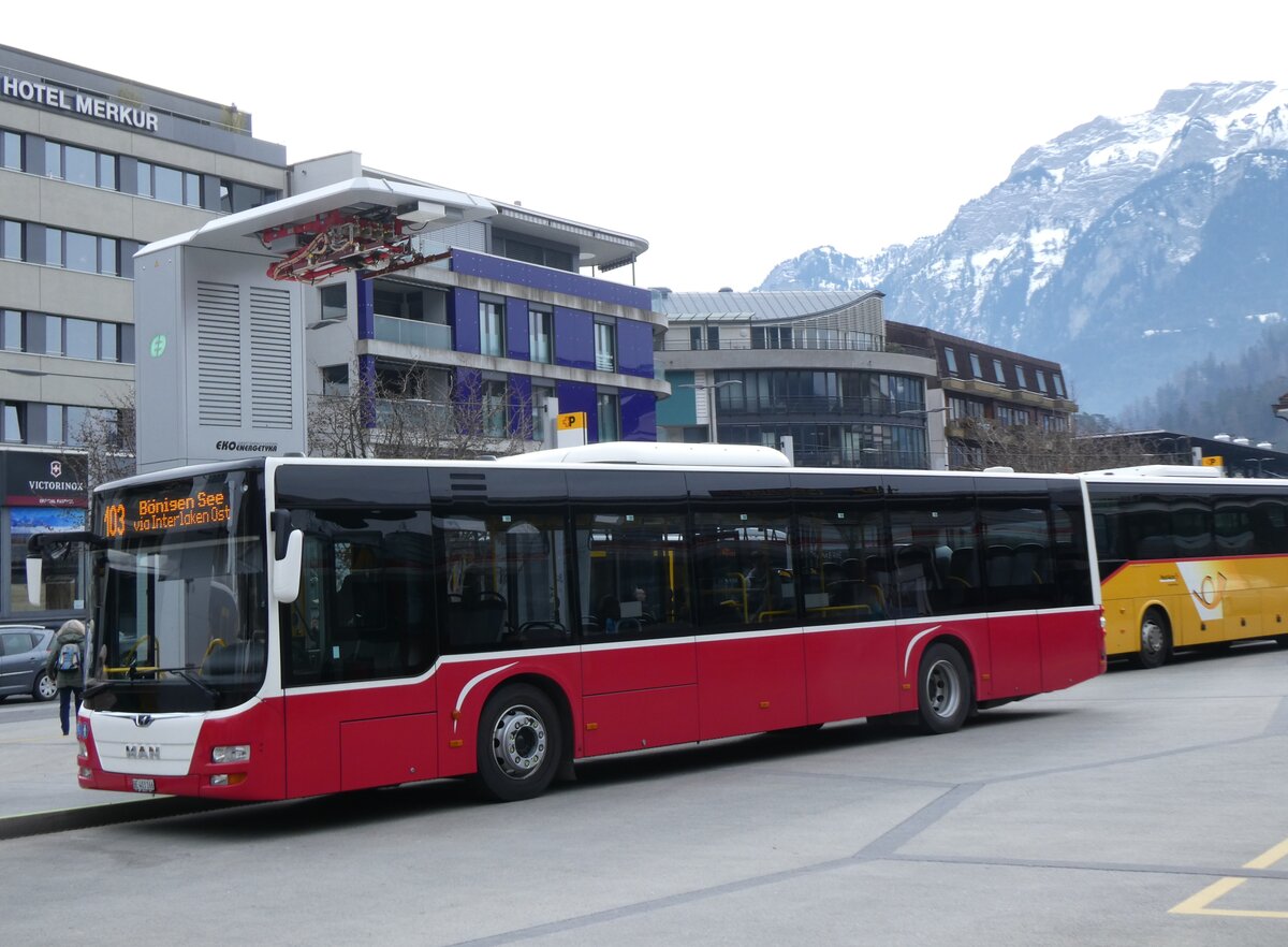 (271'836) - PostAuto Bern - BE 403'166/PID 12'336 - MAN (ex Dr. Richard, Wien Nr. 1411) am 11. Februar 2025 beim Bahnhof Interlaken West