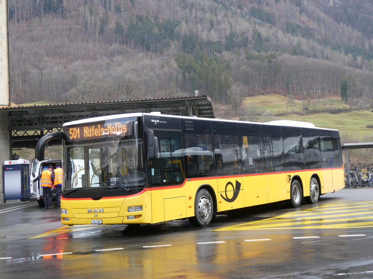 (271'860) - Niederer, Filzbach - GL 348/PID 5663 - MAN (ex Dnser, Trimmis) am 12. Februar 2025 beim Bahnhof Glarus