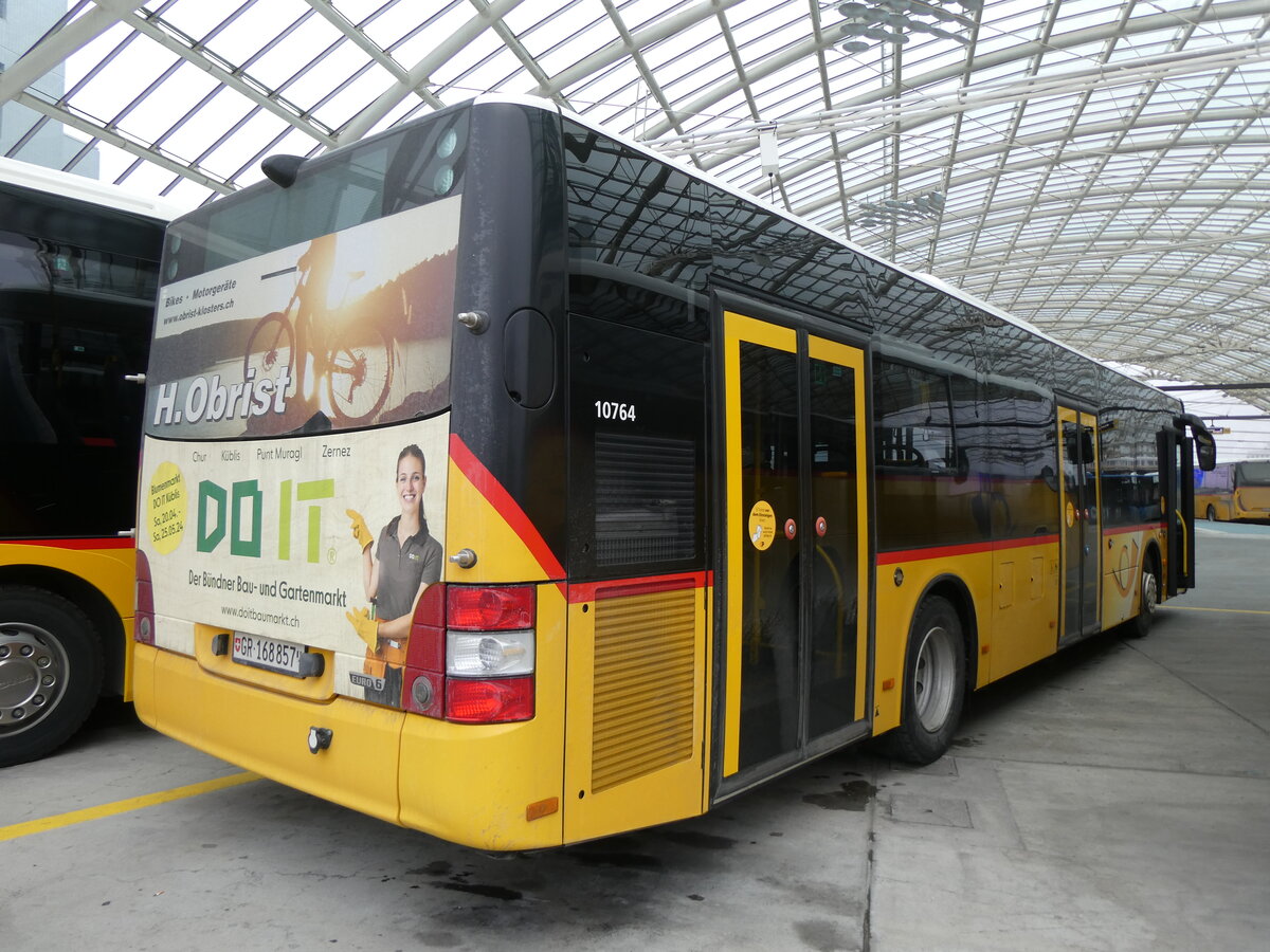 (271'937) - PostAuto Graubnden - GR 168'857/PID 10'764 - MAN am 14. Februar 2025 in Chur, Postautostation