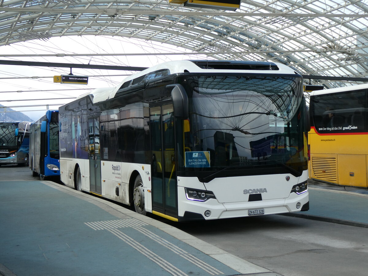 (272'037) - Rapold, Rheinau - ZH 672'328 - Scania am 14. Februar 2025 in Chur, Postautostation