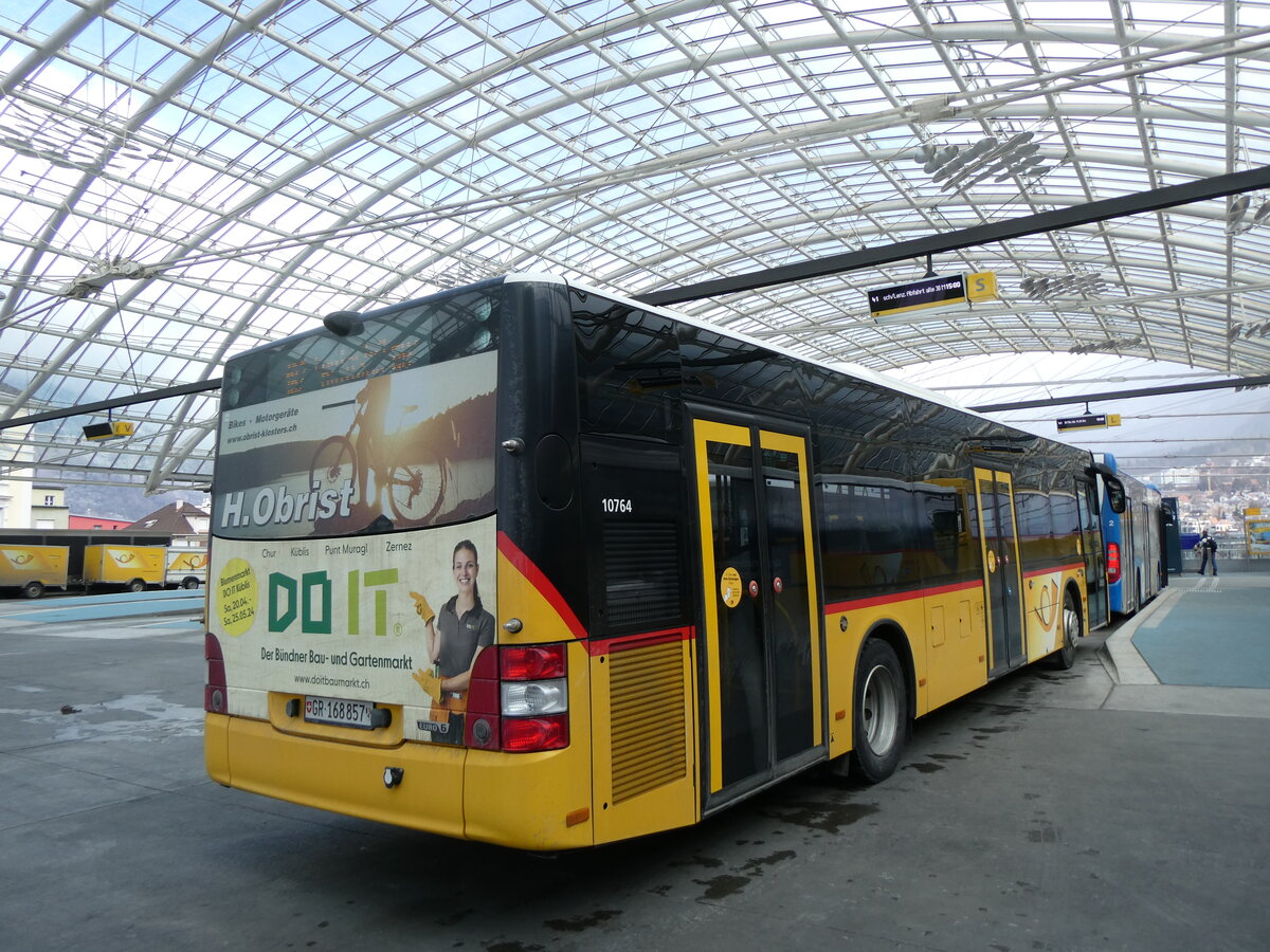 (272'053) - PostAuto Graubnden - GR 168'857/PID 10'764 - MAN am 14. Februar 2025 in Chur, Postautostation