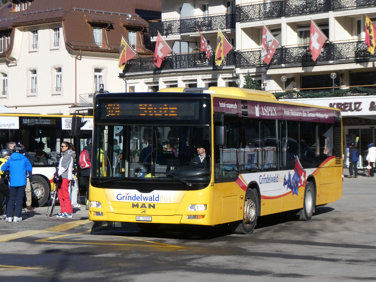 (272'162) - GrindelwaldBus, Grindelwald - Nr. 23/BE 70'397 - MAN am 17. Februar 2025 beim Bahnhof Grindelwald