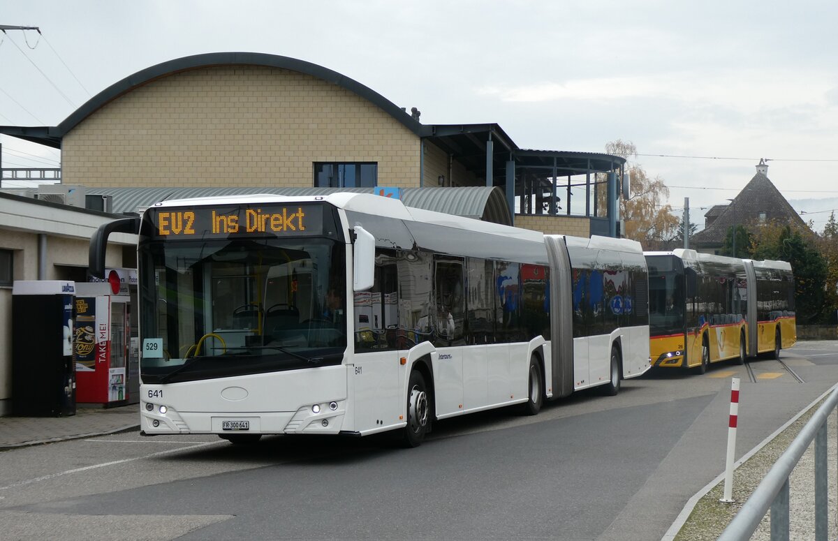 (282'023) - Intertours, Domdidier - Nr. 641/FR 300'641 - Solaris (ex PostBus/A BD 15'710) am 1. November 2025 bei Bahnhof Ins