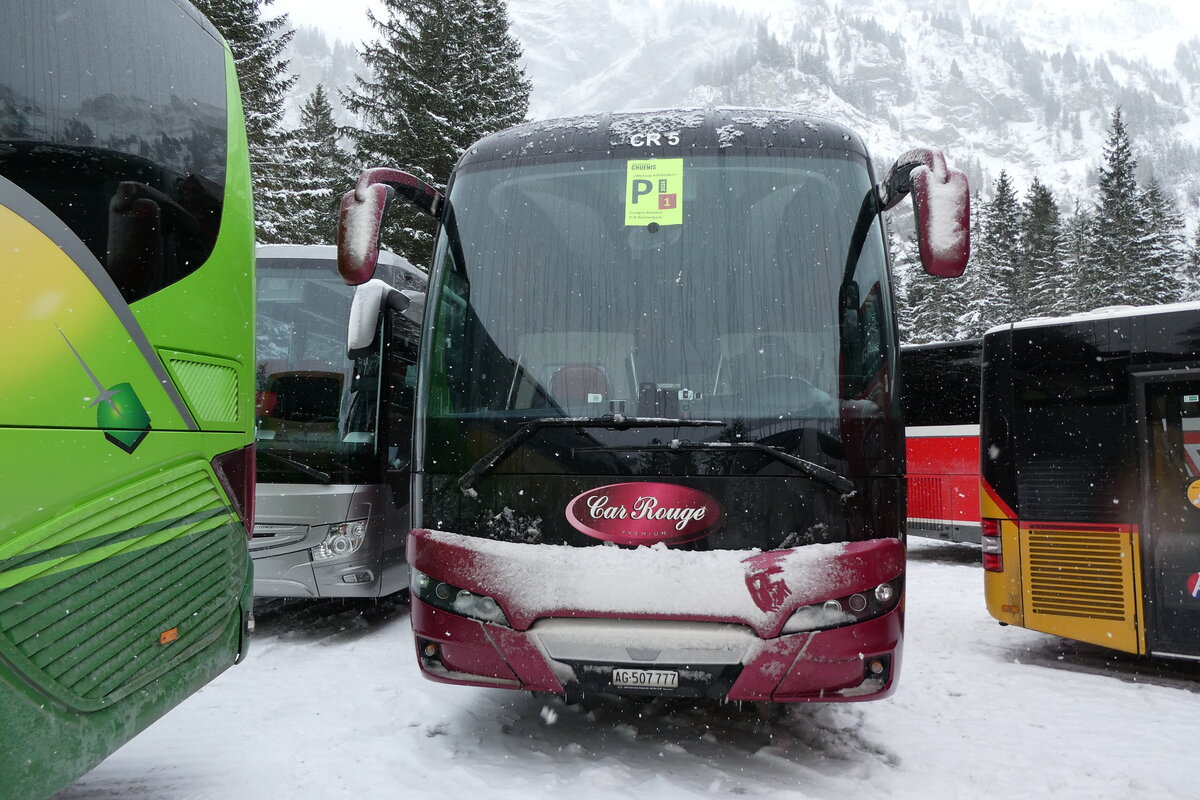(283'940) - Car Rouge, Windisch - AG 507'777 - Neoplan am 10. Januar 2026 in Adelboden, Unter dem Birg