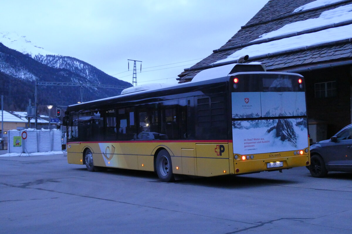 (284'844) - PostAuto Nordschweiz - BL 205'704/PID 10'317 - Solaris am 14. Februar 2026 beim Bahnhof Zernez