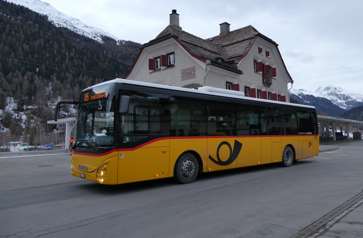 (284'855) - PostAuto Graub�nden - GR 179'715/PID 11'284 - Iveco am 14. Februar 2026 beim Bahnhof Zernez