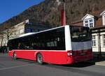 (269'901) - PostAuto Bern - BE 654'090/PID 12'33? - MAN (ex A-Wien) am 16. Dezember 2024 beim Bahnhof Interlaken Ost