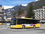 (272'183) - GrindelwaldBus, Grindelwald - Nr. 20/BE 349'361 - MAN/Gppel am 17. Februar 2025 beim Bahnhof Grindelwald