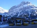 (271'315) - GrindelwaldBus, Grindelwald - Nr. 20/BE 349'361 - MAN/Gppel + Nr. 240/BE 102'240 - Mercedes + Nr. 14/BE 202'568 - MAN/Gppel am 18. Januar 2025 beim Bahnhof Grindelwald