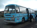 TME 134M, a 1974 AEC Reliance, fitted with a Plaxton Elite C34C body.  New to Glenton Tours, London, with the by then unusual centre entrance.  Inside the entrance door, to the left, was a wardrobe for passengers' coats!  When withdrawn, quite a few of these coaches headed to Scotland, where they were used on contract to Glenton Tours for their Scottish tours, the Glentons coach taking the passengers to the hotel in Scotland, then returning with the previous group south.  By using former Glenton coaches on these tours, it meant that passengers kept the same seats on the coach, the livery being the only difference.

TME 134M is seen here in Whitby, North Yorkshire, whilst in preservation, on Sunday 22nd April 2007.  Subsequently sold for further preservation, but then scrapped.