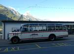 (240'594) - Evasion, St-Maurice - VS 31'954 - Saurer/Lauber (ex Zumwald, Fribourg; ex Leu, Arosa; ex Schett, Sargans; ex P 23'165; ex P 2252) am 2. Oktober 2022 beim Bahnhof Martigny