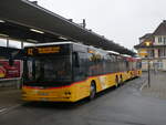 (269'850) - PostAuto Bern - BE 811'692/PID 11'425 - MAN am 14. Dezember 2024 beim Bahnhof Spiez